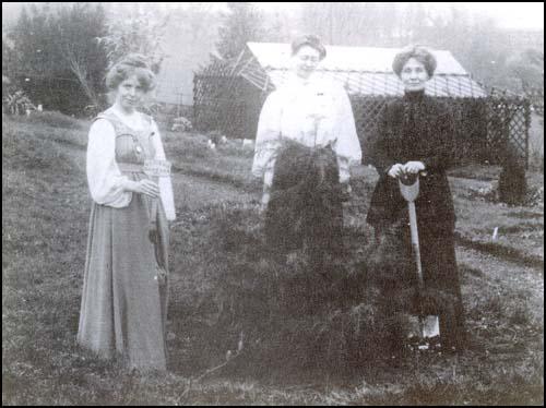 Annie Kenney, Mary Blathwayt and Emmeline Pankhurst planting trees at Eagle House.